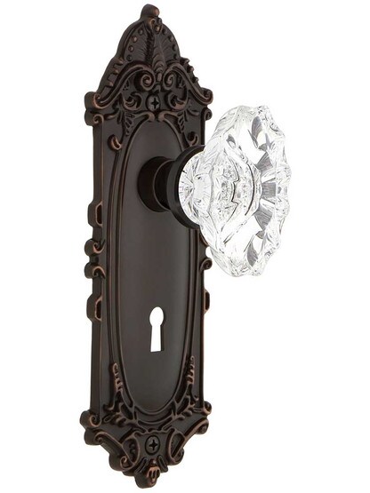 Largo Door Set with Keyhole and Chateau Crystal Glass Knobs in Timeless Bronze.
